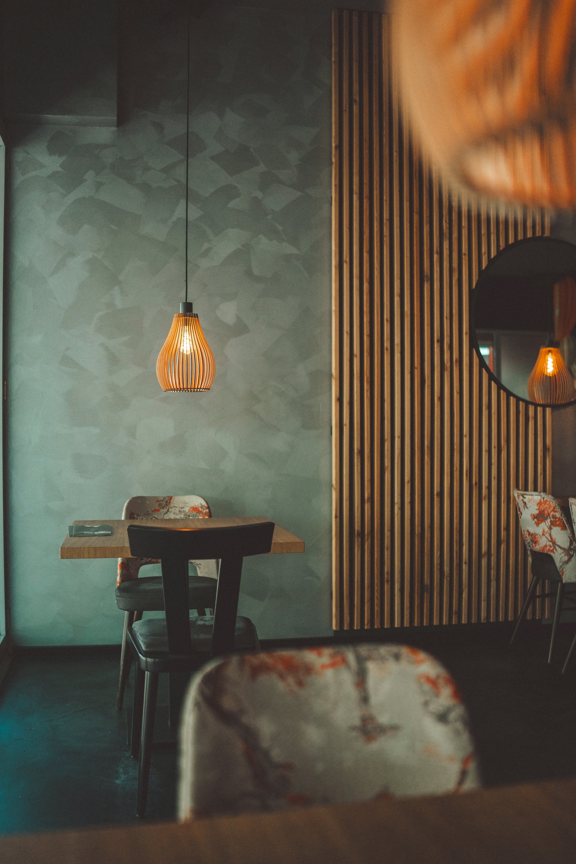 Warm modern fine-dining restaurant interior