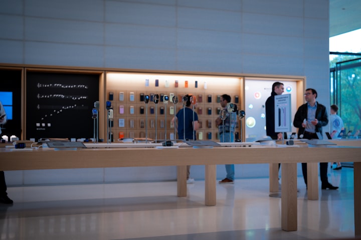 Customers browsing in a modern electronics store