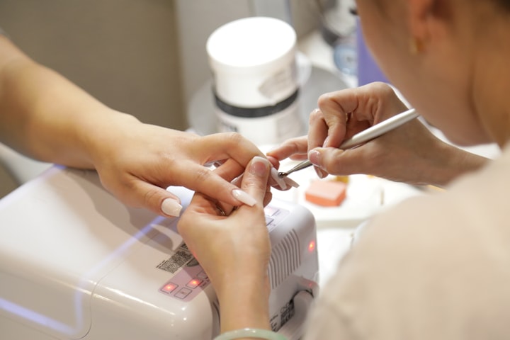 Manicure being done at a nail bar