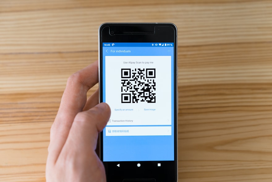 Smartphone displaying a QR code for instant check-in